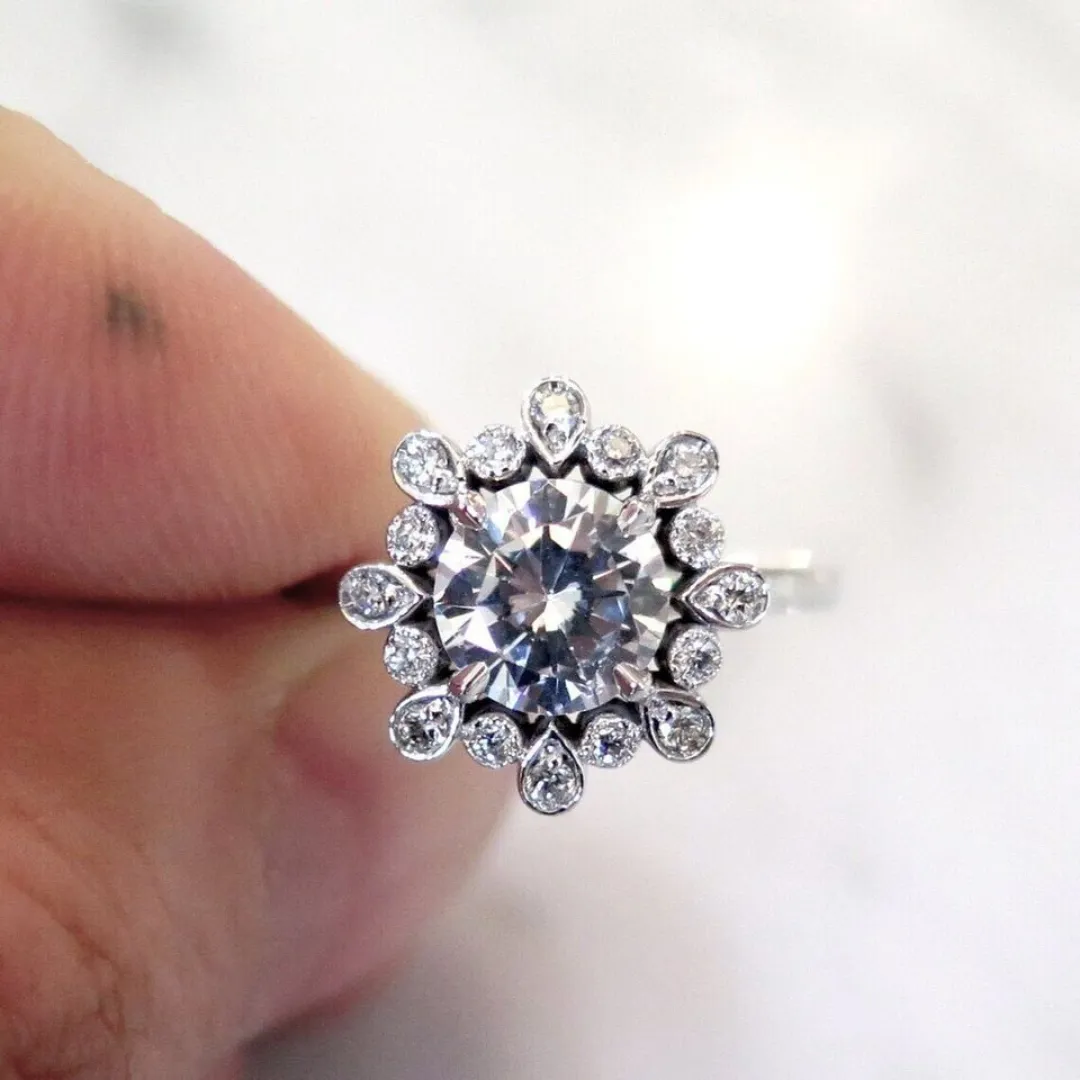 /public/photos/live/Round Cut Moissanite Floral Halo Engagement Ring 721 (2).webp
